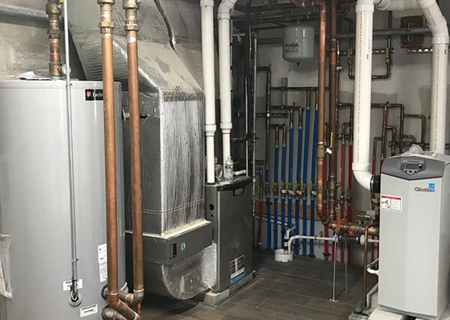 Hydronic heating manifold and zone valves in an older Denver home